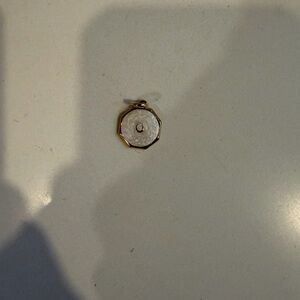 Elegant Gold and White Pendant